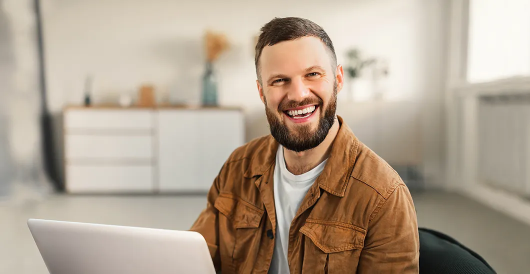 Man with tablet in home office